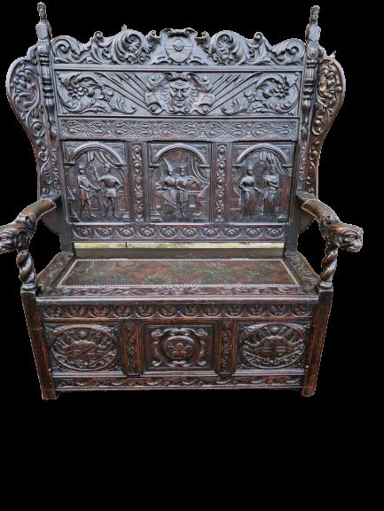 a stunning 19thc jacobean carved oak box seat settle