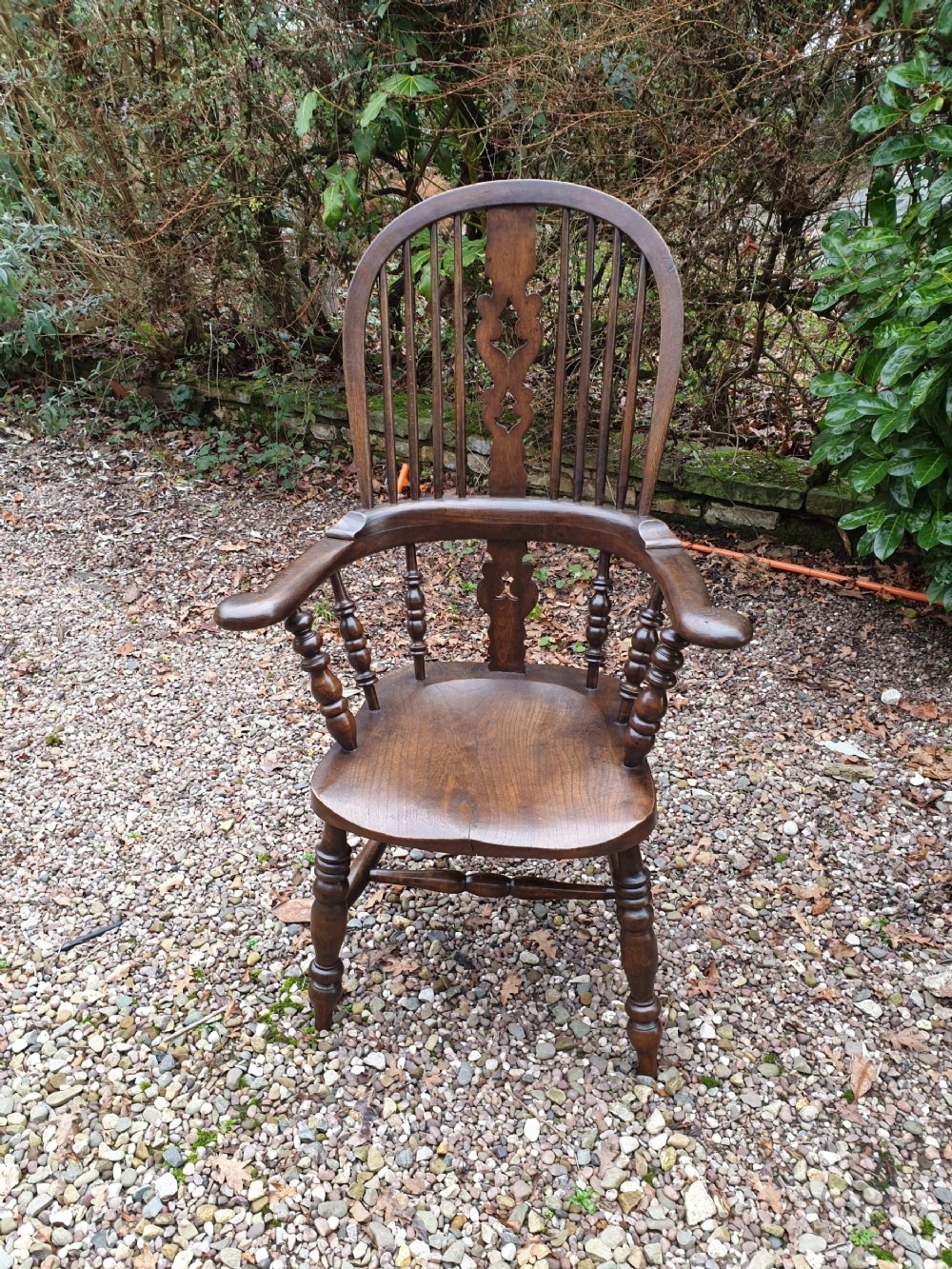 a good 19thc ash and elm broad arm windsor armchair