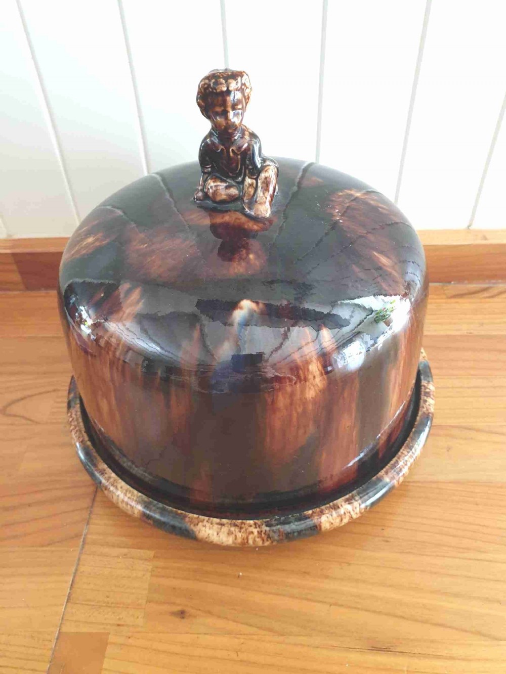 scarce 19th century treacle glazed cheese dish with young boy finial