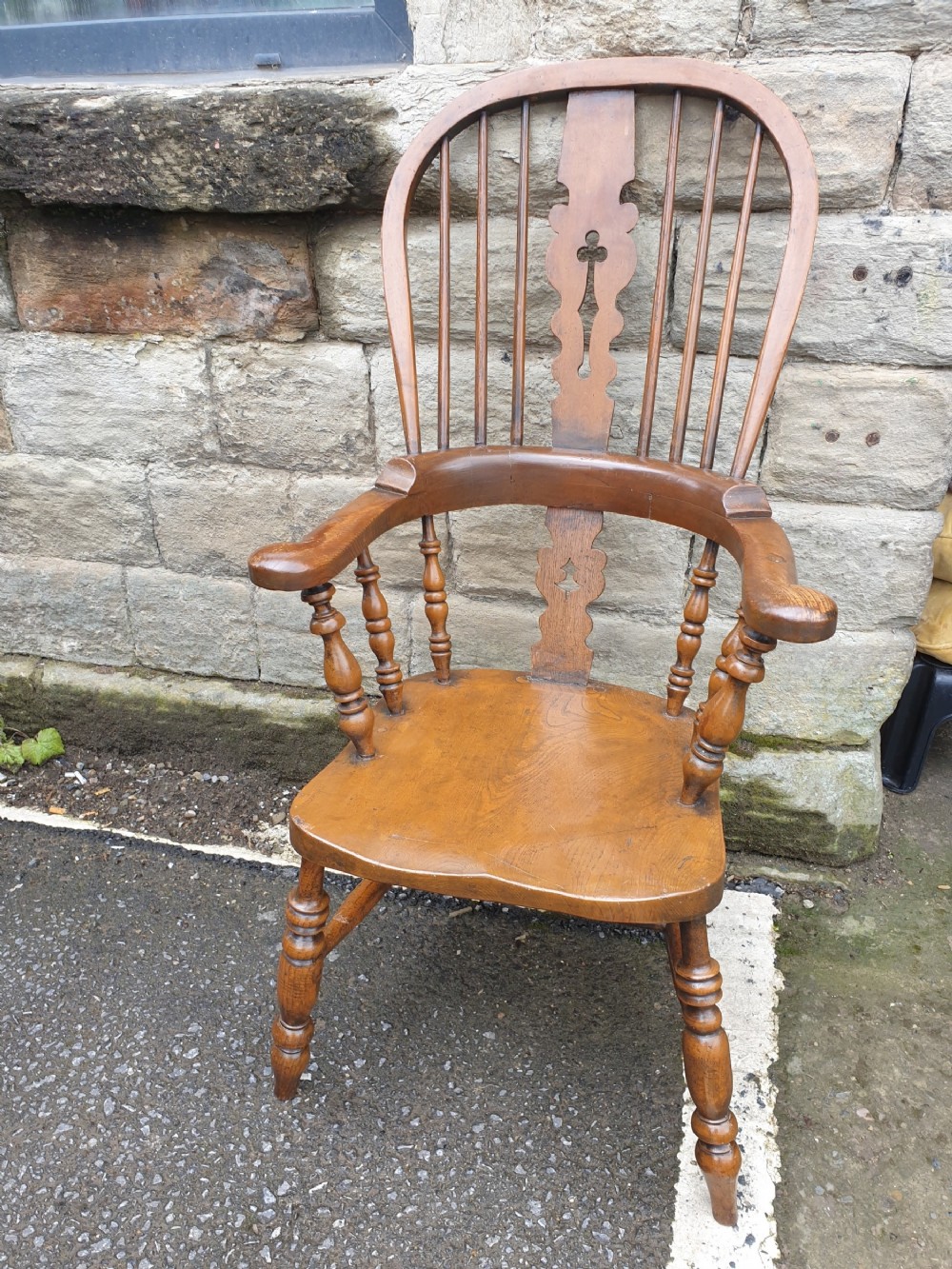 a good antique ash and elm broad arm windsor armchair