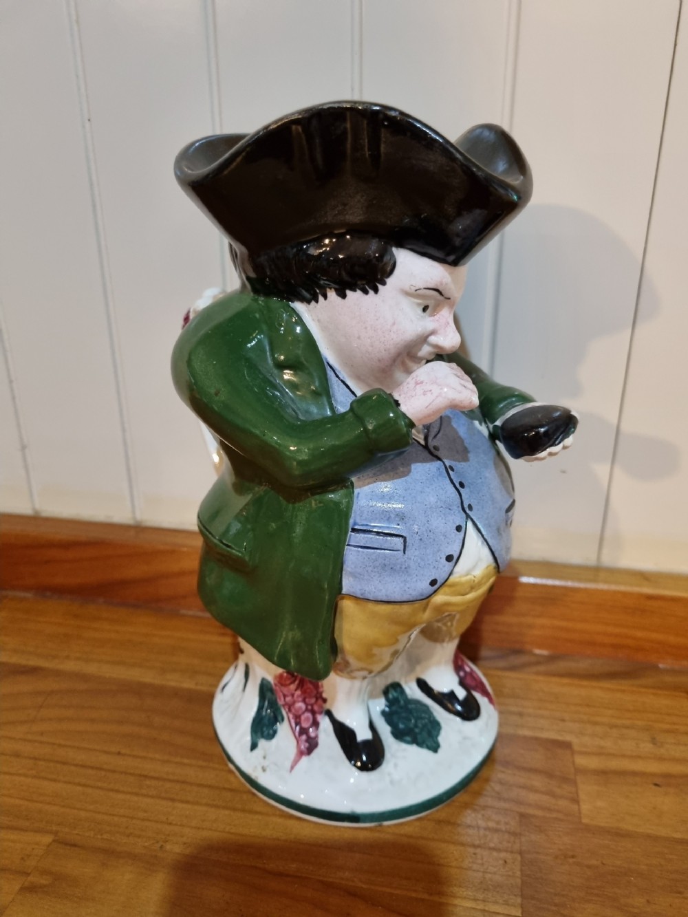 a large 19th c scottish toby jug of the snufftaker in classic scottish colours