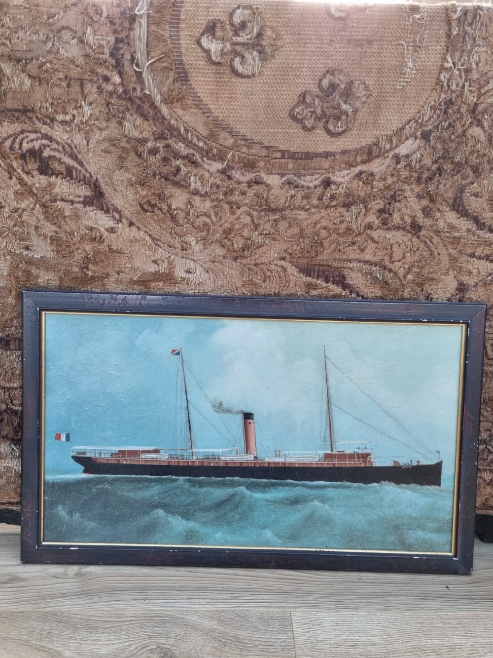 early 20thc oil painting of a tramp steamer hating