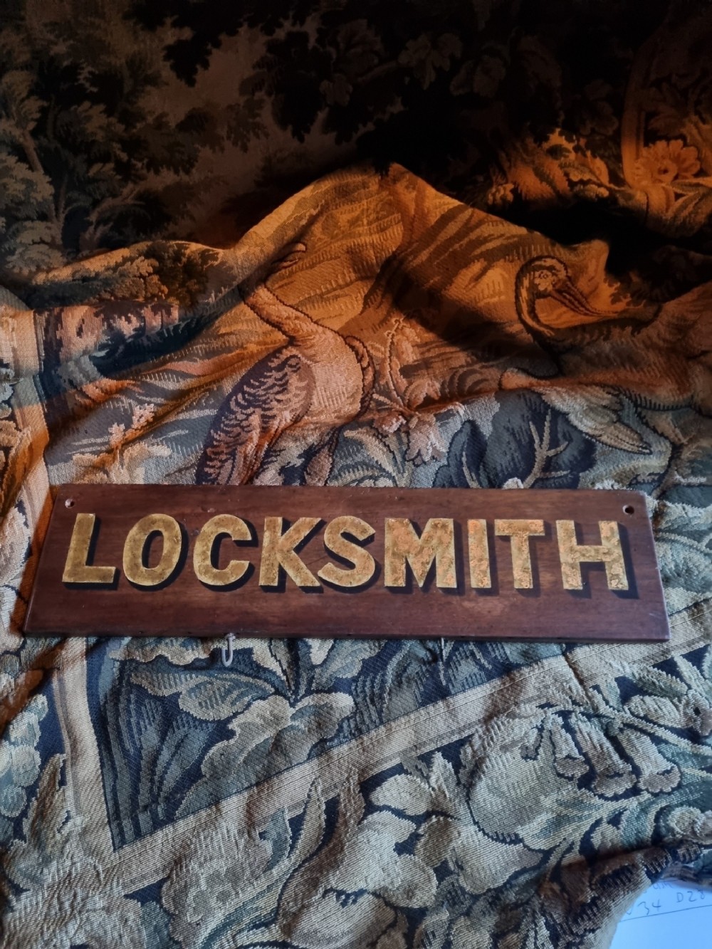 oak decorated locksmith sign