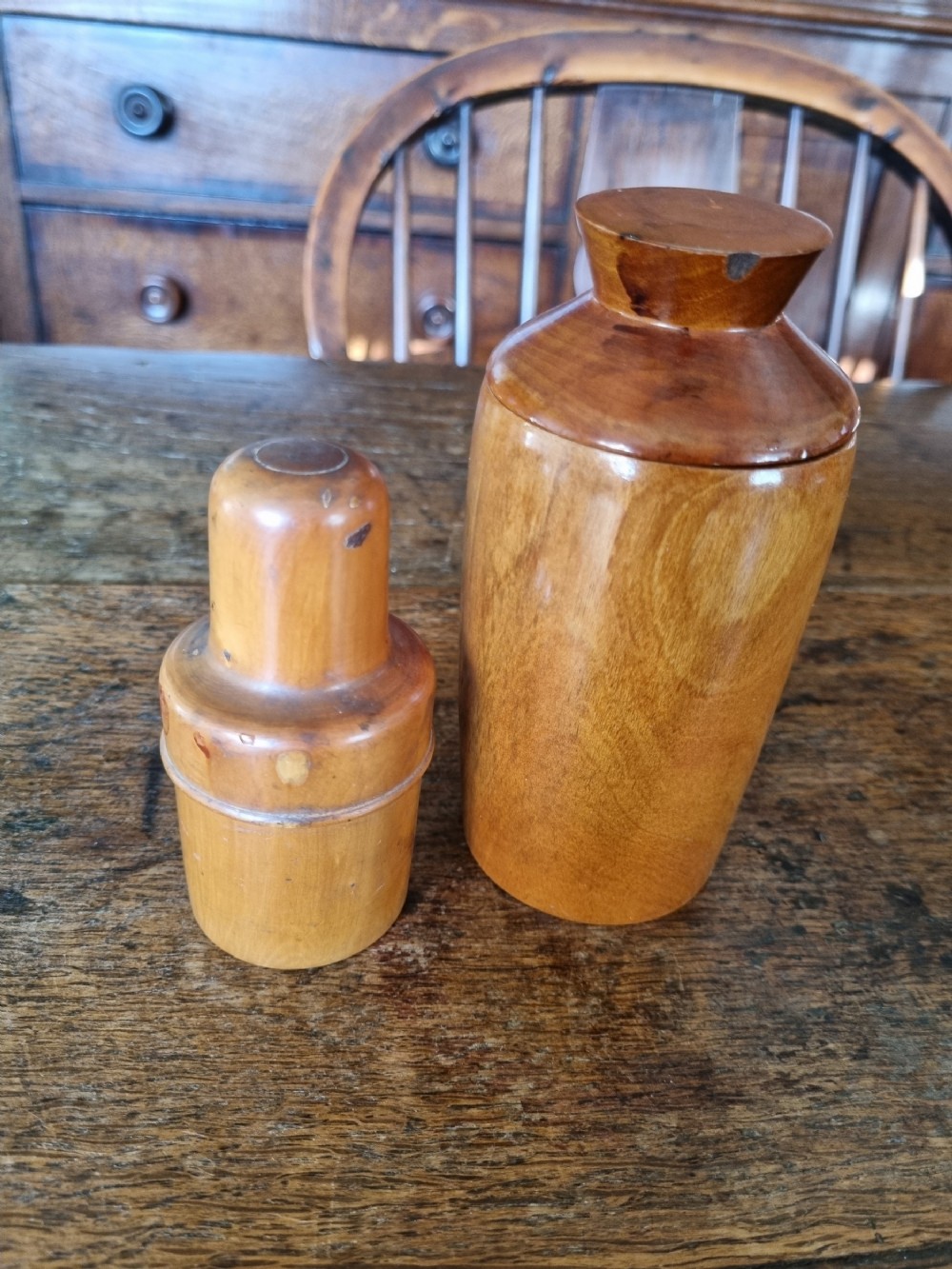 a 19thc sycamore jar and cover plus a smaller one