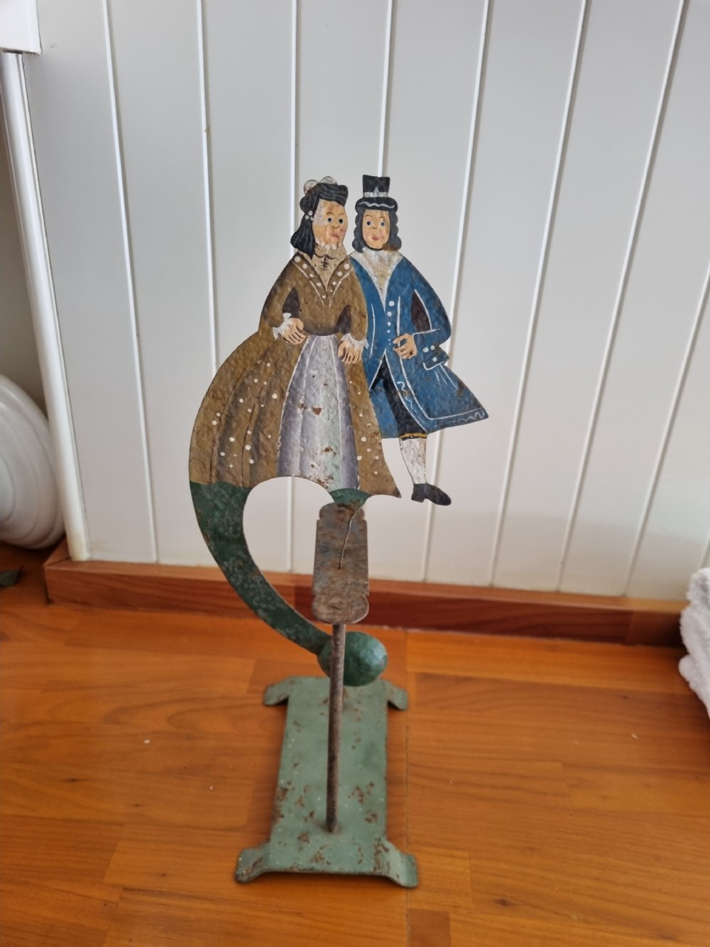 19thc metal rocking toy of a courting couple