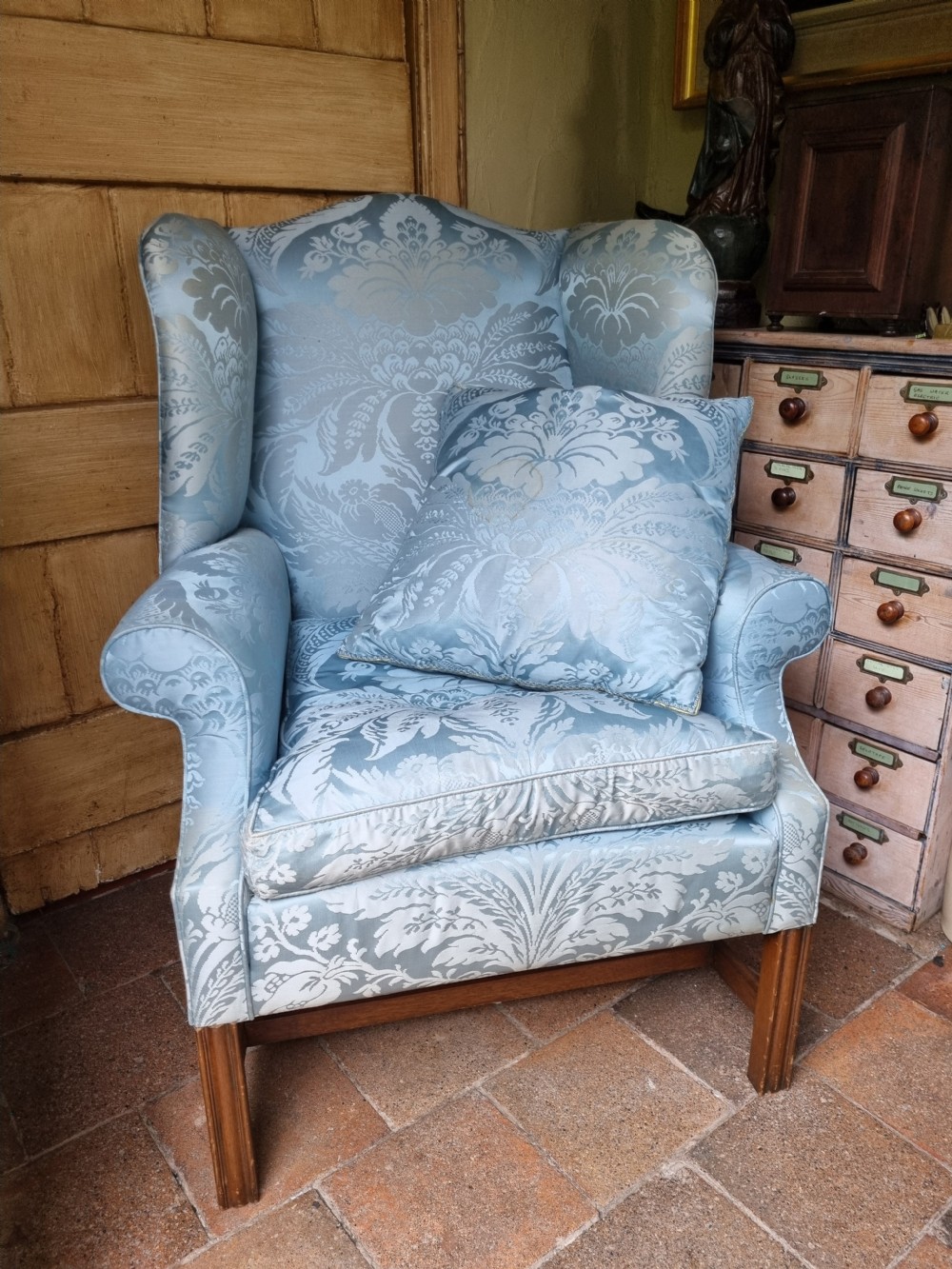 superb mahogany shaped wing armchair