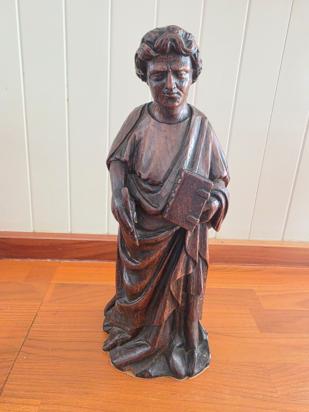 17thc oak carving of a scribe man