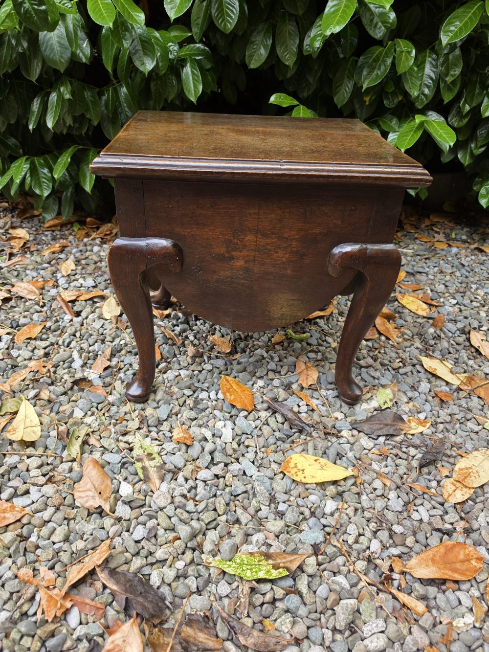 an e 18thc oak stool on cabriole legs