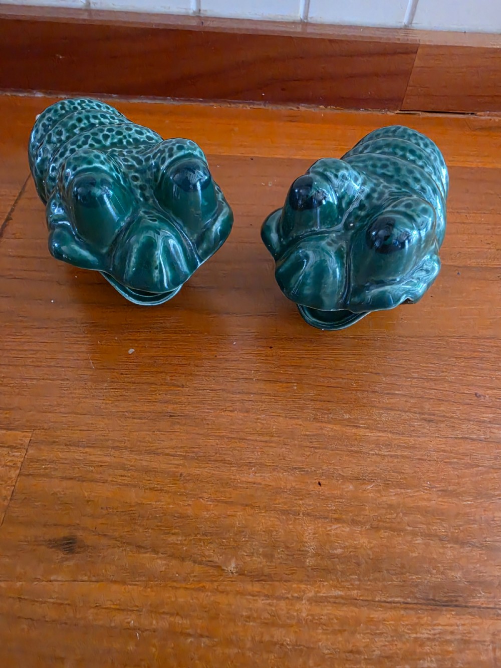 a unusual pair of grotesque majolica plant waterers c1930